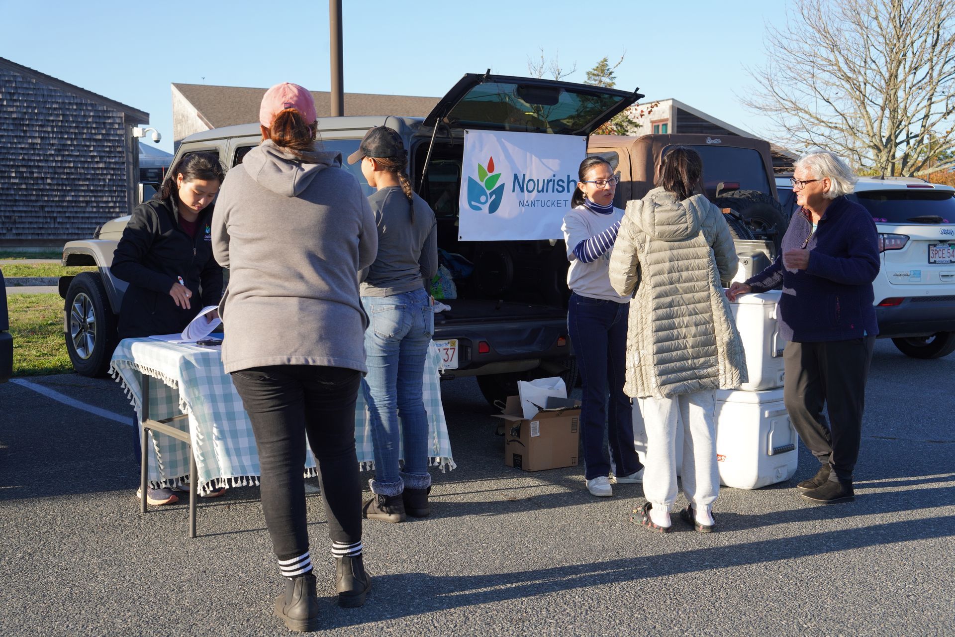 Volunteers delivering prepared meals